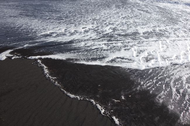 This is not a black and white picture, it's black sand on the beach