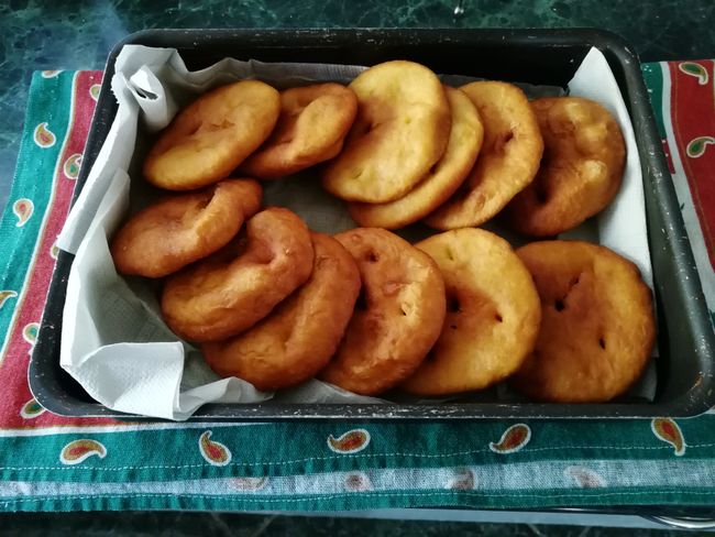 Fried pumpkin rolls (Sopaipillas) are especially enjoyed in cold, rainy weather