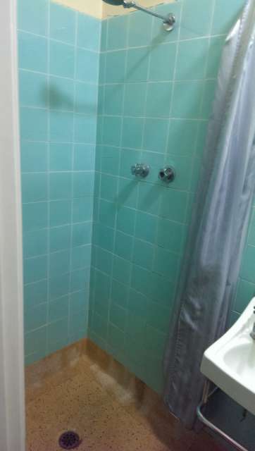 Shower that made everything wet because the curtain was too short