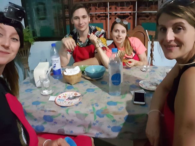 Toni, Barbora, and Edina eating together (cooking class)