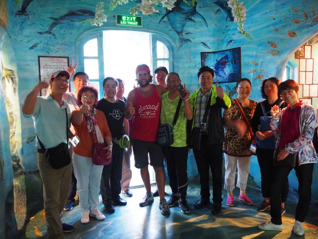 Freundliche chinesische Touristen-Gruppe