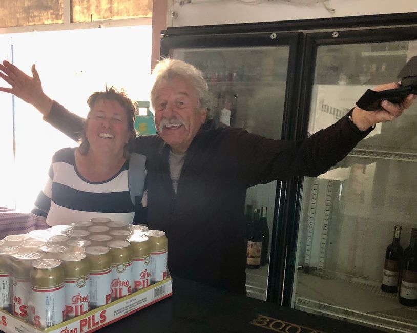 Volker and his Renate are happy about a new supply of canned beer.