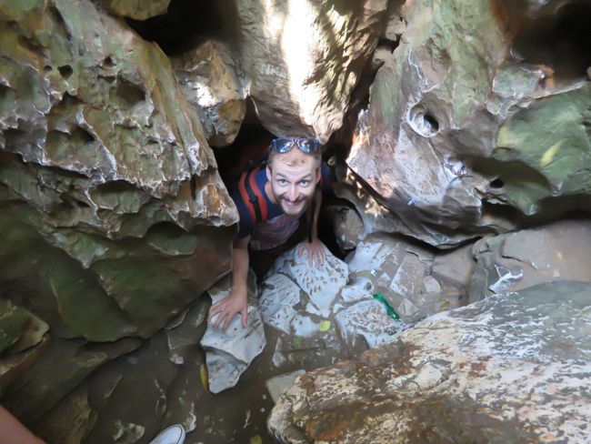 Climbing through the caves of the Marble Mountains
