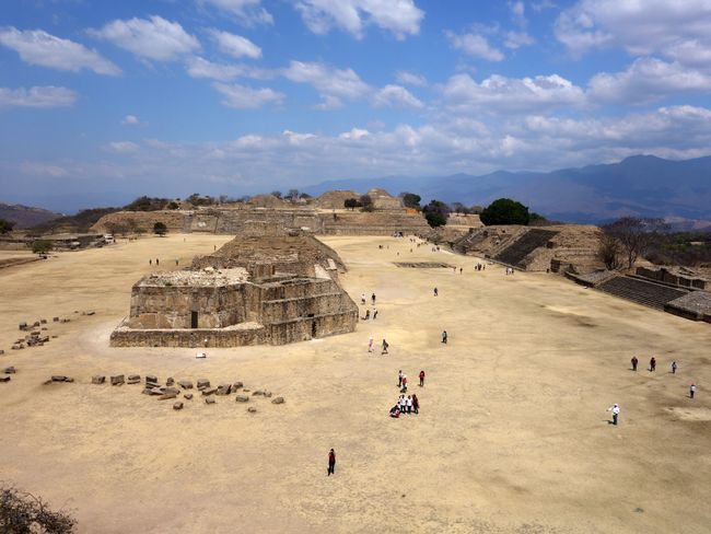 The magnificent plaza of Monte Alban seen from the pyramid on one narrow side and ...