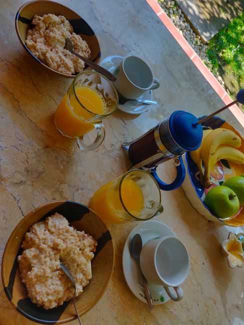Porridge, Fruit, Coffee & Orange Juice for Breakfast