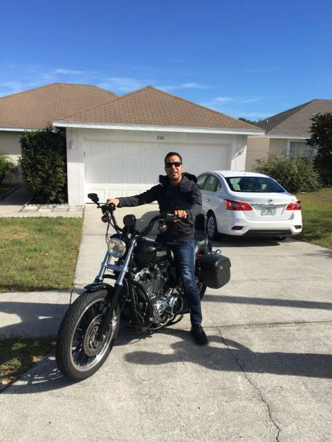 Zack (Host in Orlando) on his Harley
