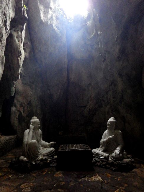 Marble mountain: two statues playing Chinese chess