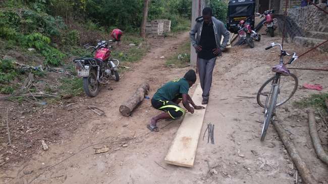 Workbench in Tanzania: straightening iron bar