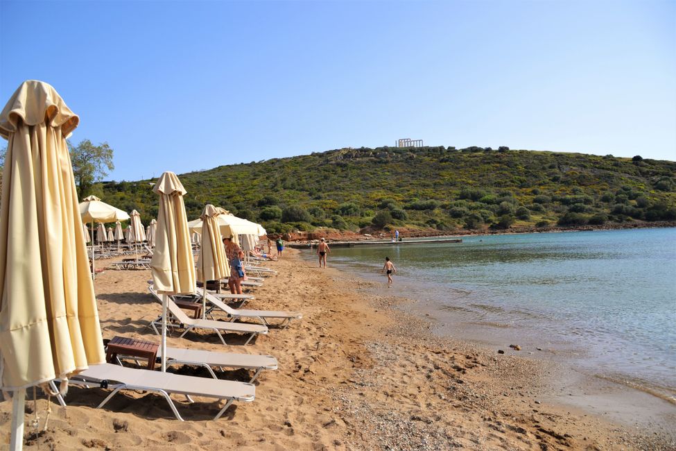 One of the beaches with many sunbeds and umbrellas, but with a view of the Temple of Poseidon.