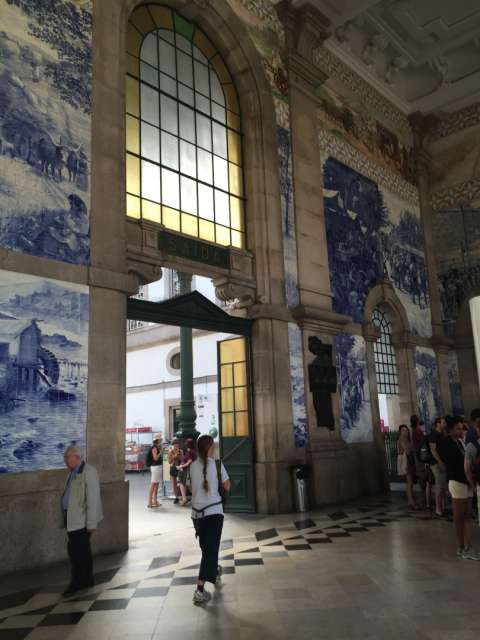 even the train stations are beautifully adorned with tile pictures 