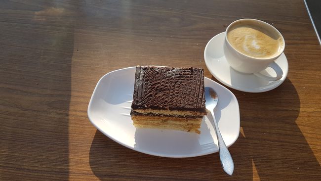 Cake and cappuccino.