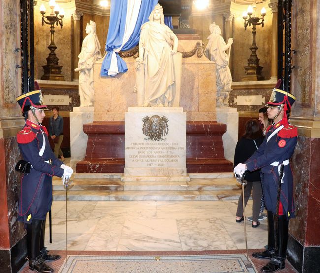Revolutionary monument in the cathedral and saber-armed honor guard