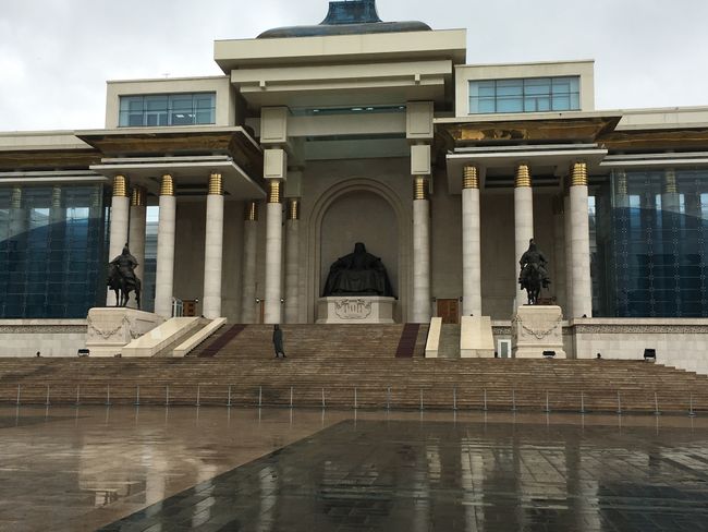 The government building with Chinggis Khan at the door.