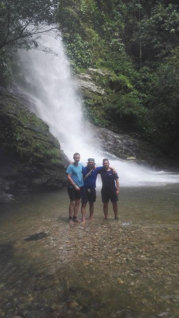 In front of the waterfall