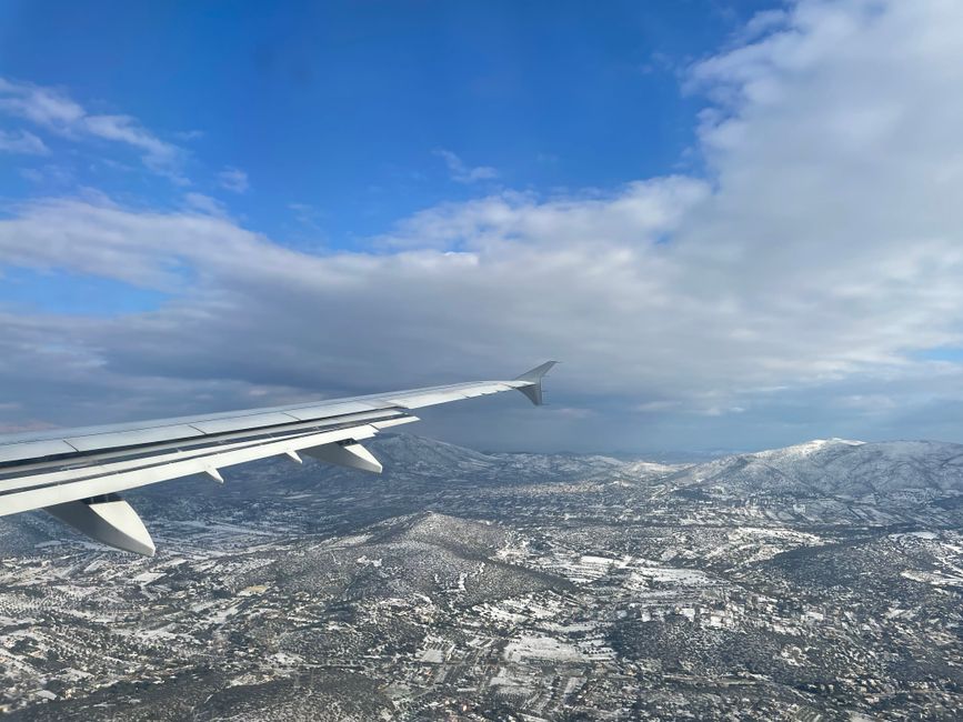 Snow-covered Greece during approach to ATH