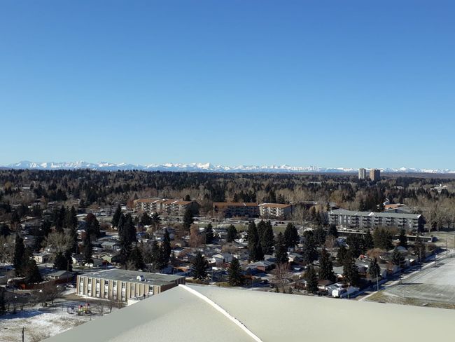 Calgary with the Rockies in the background