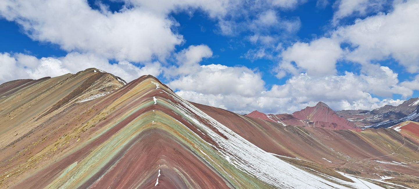 Rainbow Mountain - while we wore 4 layers of clothing, the locals scraped the ice off the stairs barefoot.
