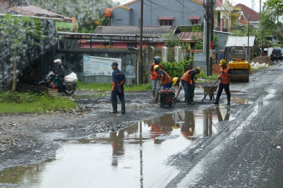 Road workers. Each is responsible for one task
