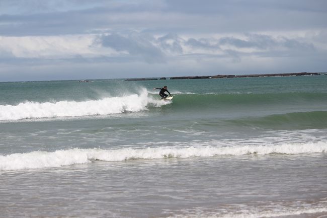 Tim surfing at Porpoise Bay