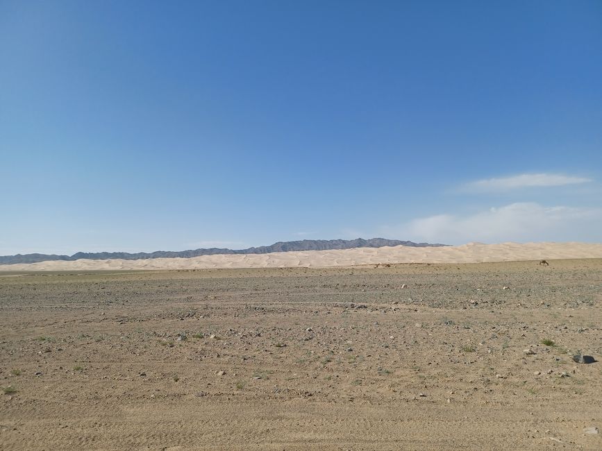 The sand desert swallows the rock desert