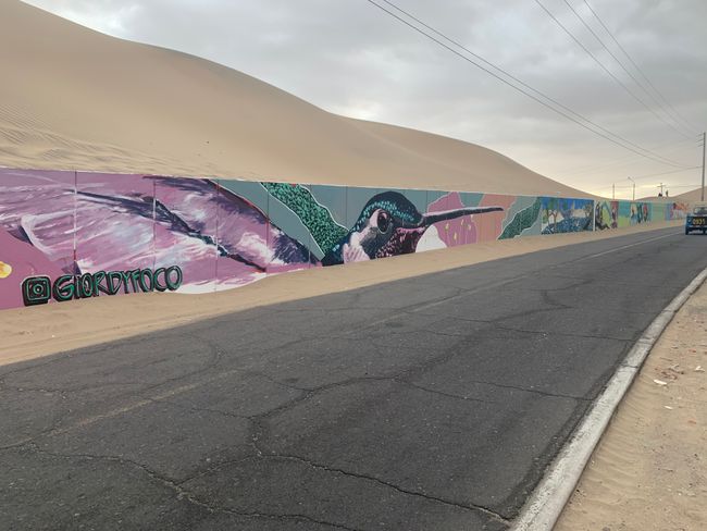Street Art on the access road to Huacachina