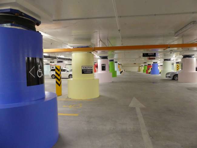 Earthquake dampers on the pillars of an underground parking garage