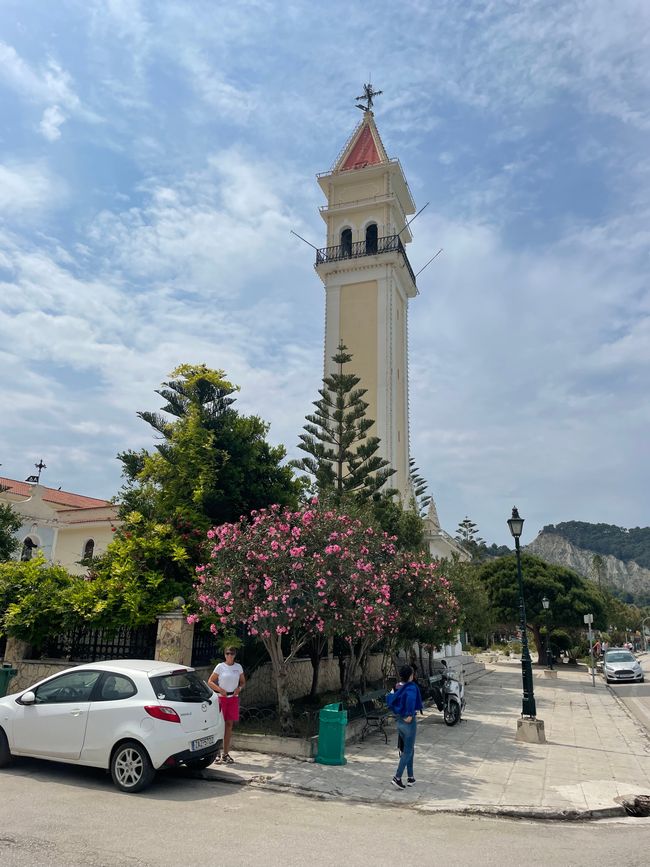 In front of the Bell Tower, the landmark of the city