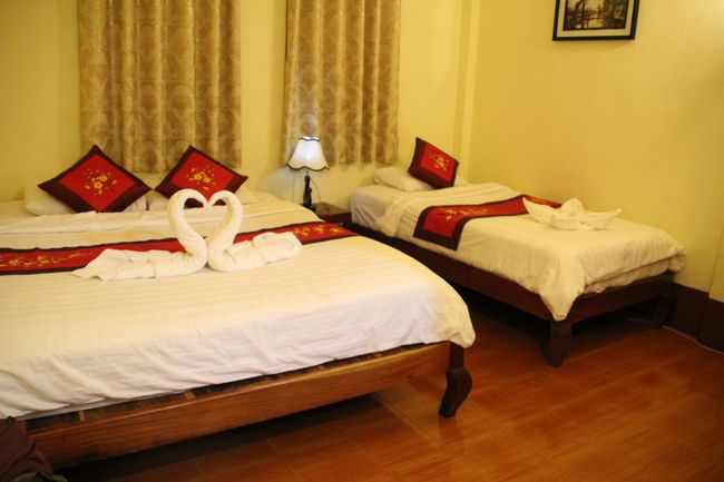 Our room: one double bed and one single bed