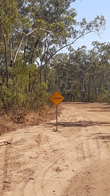 There are these signs everywhere in Australia that show how high the water is in case the road is flooded. 