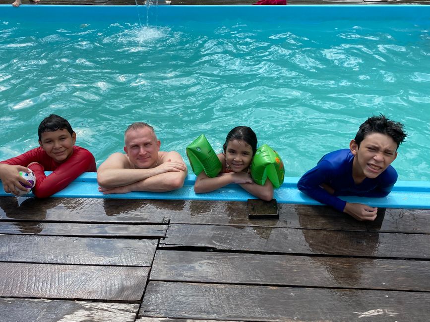 With the children in the pool