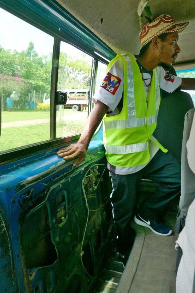 Our guide in the bus. Notice the door mechanism!