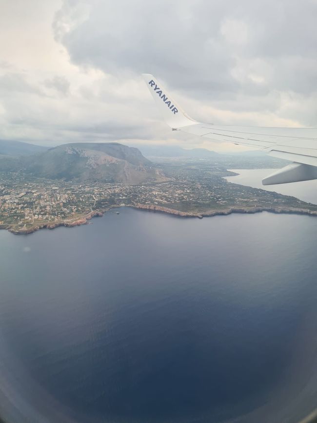 Im Flieger/Sull'aereo 