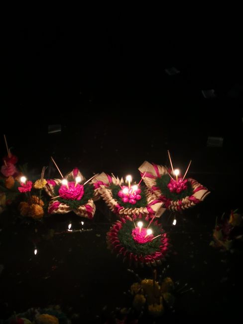 And floating flower boats with candles on the lake.