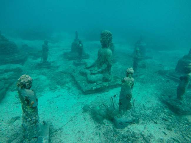 Underwater Buddha statue