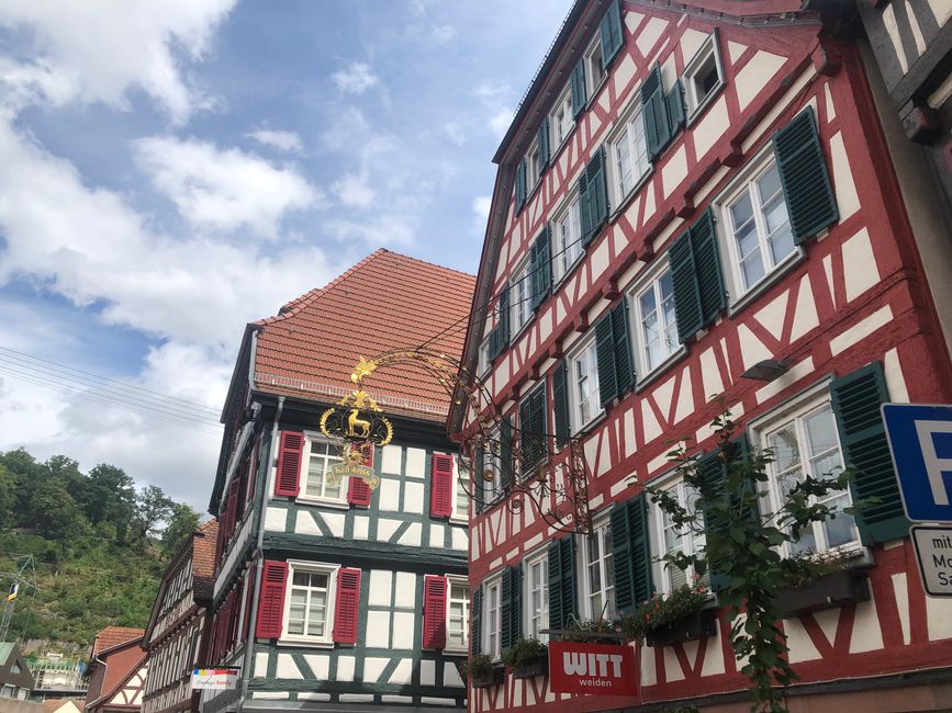 Half-timbered houses and beautiful guild signs on the house facades