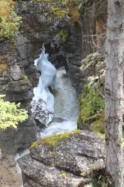 through narrow gorges (ice is deposited on the edge)