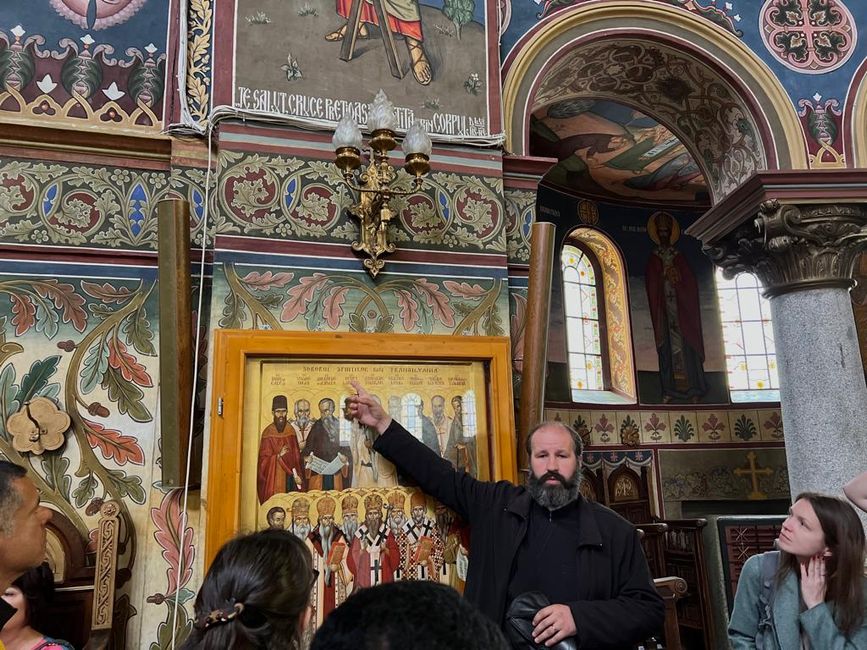 Mr. Ionița explains the saints of the region.
