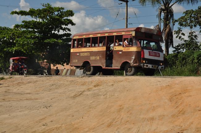 A typical bus from Iquitos, which consists of the basic structure and driver's cab of a Hyundai truck and a wooden sheet metal construction