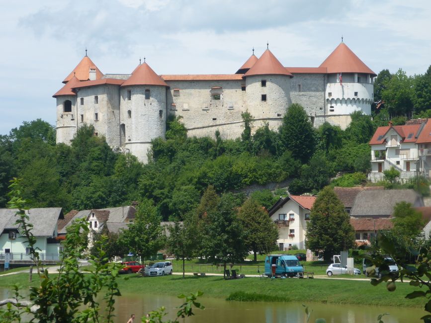 The castle of Zuzemberk, you can camp below it. There is flowing water only in the river.