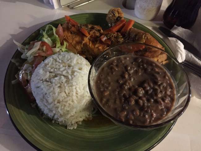 Typical Panamanian: Chicken with rice, beans, and a dollop of salad