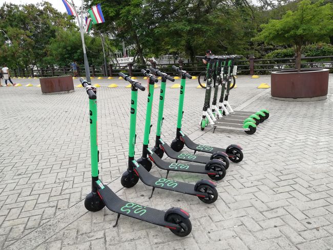 Electric city scooters are available for rent.