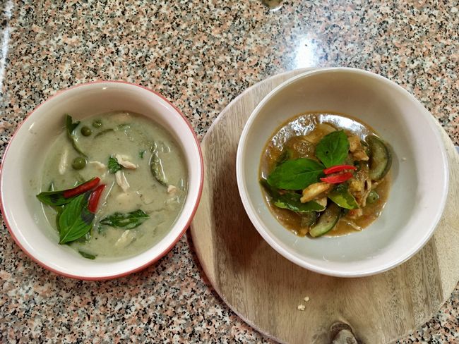 Left: Hot and sour soup with prawns. Top: Minced meat with Thai basil and vegetables (Paddy)