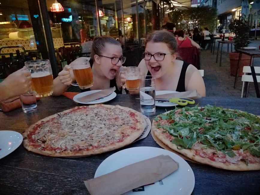 Giant pizzas and local beer.