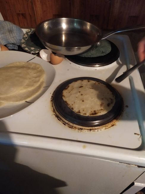 To get the tortillas crispier, Noemy briefly places them directly on the hot stove