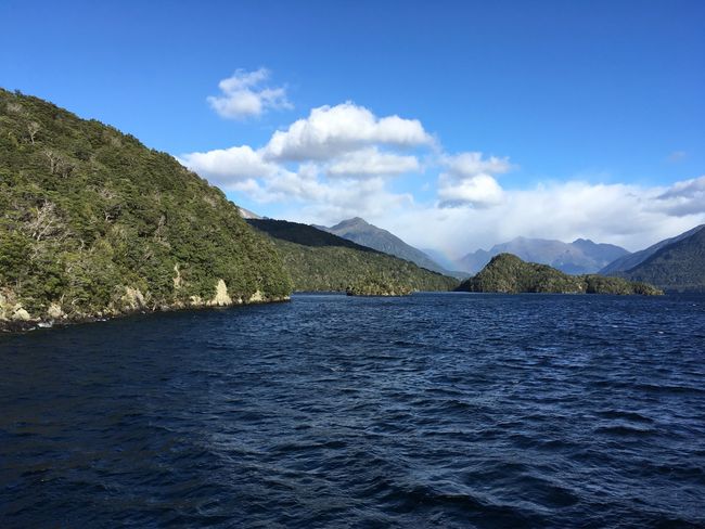 Taking a boat on Lake Te Anau on the way to the cave