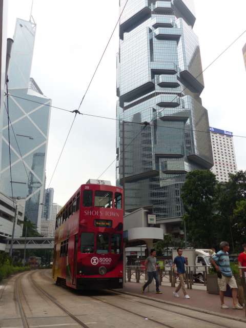The tram is double-decker. Hong Kong is hypermodern and traditional