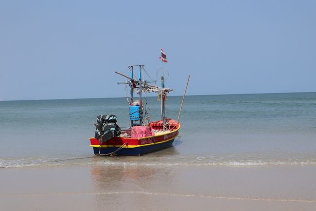 A boat on the beach.