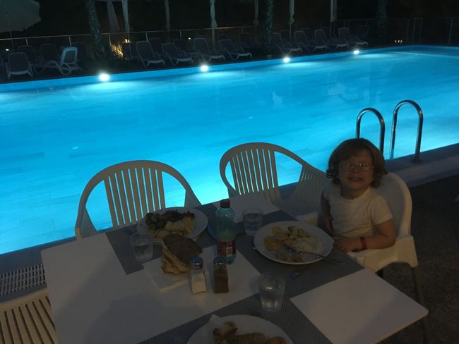 Dinner by the pool is fun for everyone