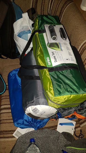 Two mattresses, two sleeping bags, and a tent.