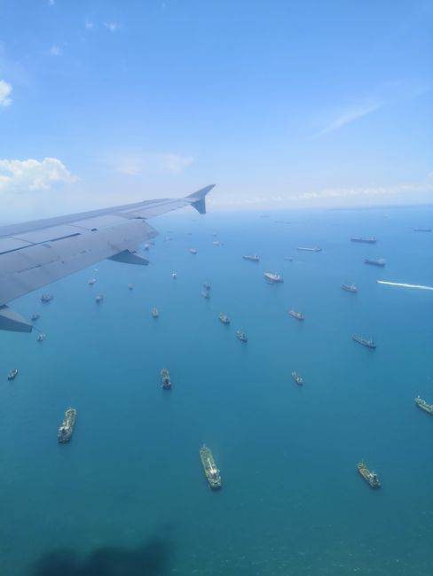 Flying into Singapore, busy waters
